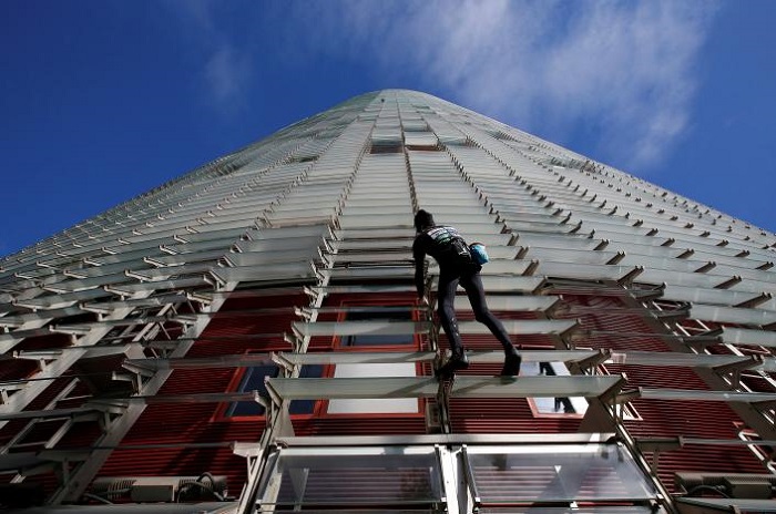 French `Spiderman` climbs Barcelona skyscraper harness-free 